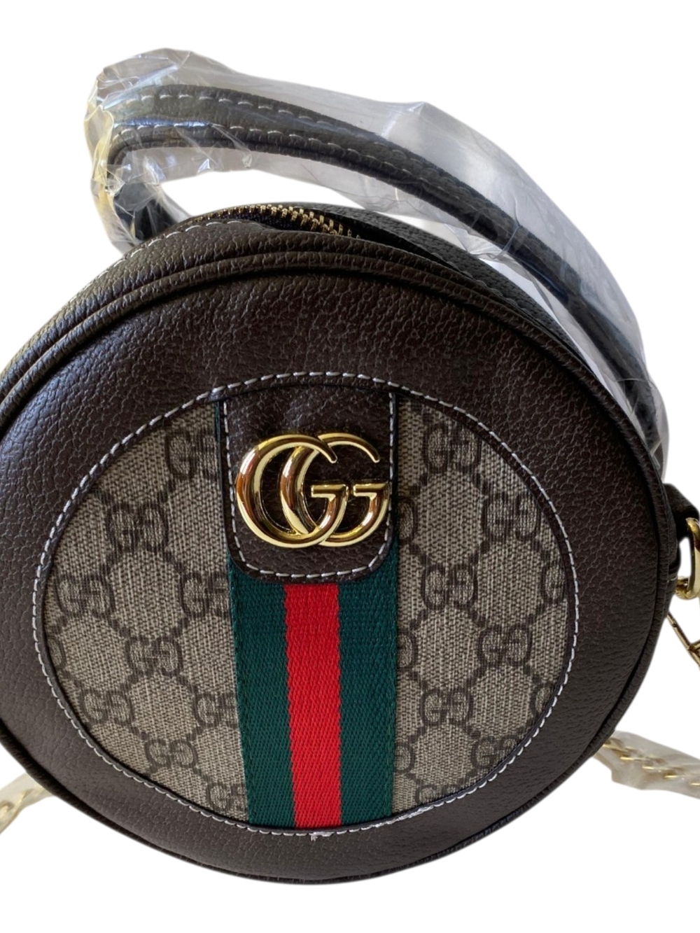 Tote Round Crossbody with Green-Red Web


Longest length: 7.25 in
Height7.25 in